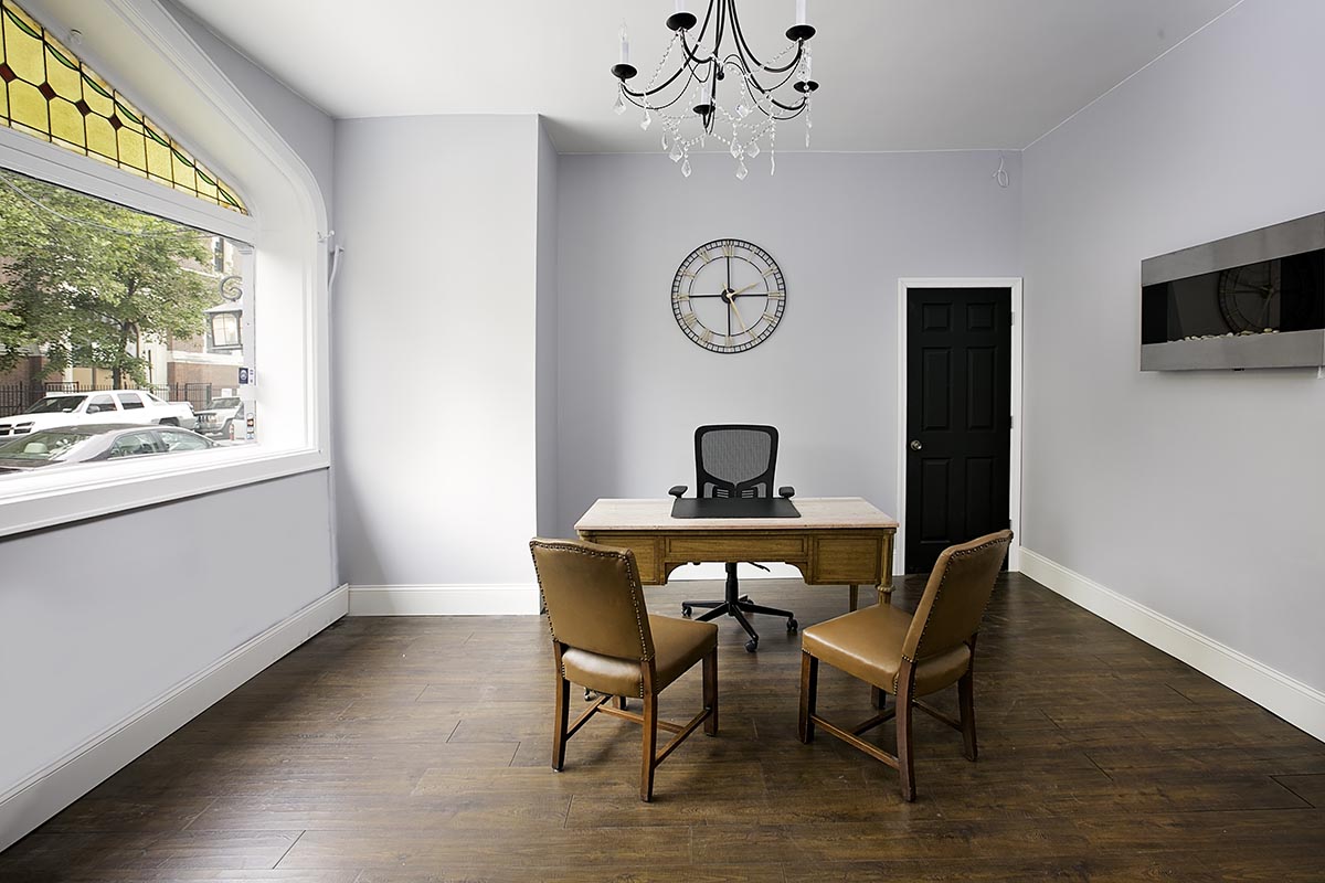 San Jose Funeral Home Chapel - main office with a desk and two chairs